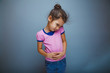 © maxximmm - Teen girl child stomach ache on  gray background