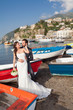 Married couple at the beach in Sorrento coast.