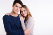© W PRODUCTION - close up studio portrait of a beautiful young couple man  woman
