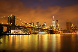 Fototapeta  - New York City Manhattan Downtown with Brooklyn Bridge at dusk