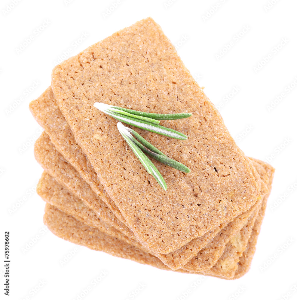 Crispbread with sprigs of rosemary isolated on white background