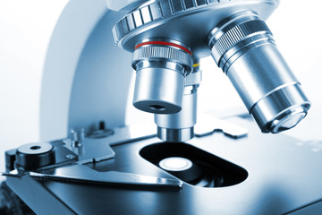 Wall Mural - microscope close-up, isolated on white