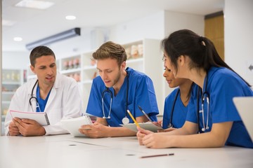 Wall Mural - medical students sitting and talking