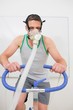 © WavebreakMediaMicro - Man doing fitness test on exercise bike