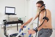 © WavebreakMediaMicro - Man doing fitness test on exercise bike