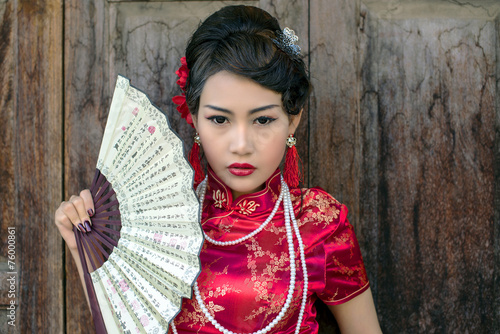 Naklejka ścienna Chinese woman red dress traditional cheongsam