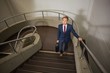 © WavebreakMediaMicro - Businessman going up the stairs