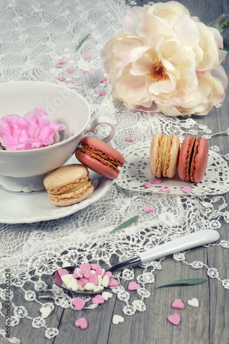 Fotografie, Obraz Valentine's Day: Romantic tea drinking with macaroon and hearts