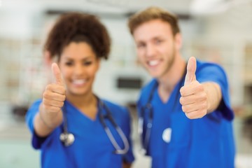 Wall Mural - young medical students showing thumbs up