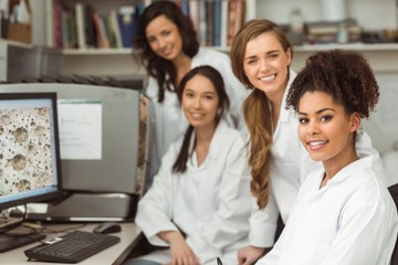 Wall Mural - science students smiling at camera