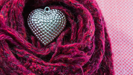 Wall Mural - Close up Silver heart on scarves decorated for Valentine's Day.