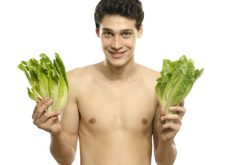 Wall Mural - Skinny young man eating an organic healthy salad and dieting