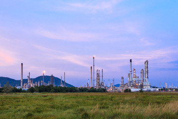 Oil refinery plant at twilight night