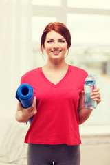 Sticker - smiling girl with bottle of water after exercising