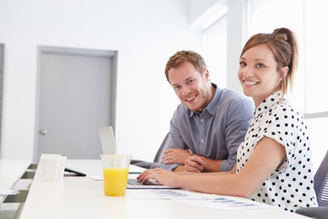 Wall Mural - Man And Woman Working Together In Design Studio