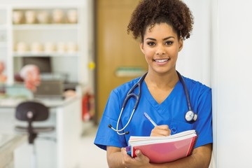 Wall Mural - young medical student taking notes