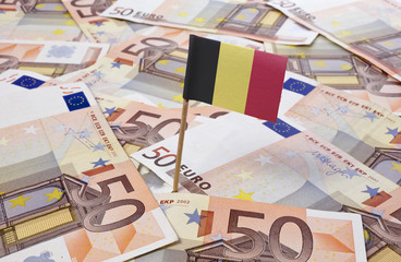 Flag of Belgium sticking in 50 Euro banknotes.(series)