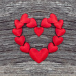 Valentines day red hearts ornament on wooden background