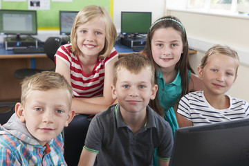 Wall Mural - Group Of Elementary Pupils In Computer Class