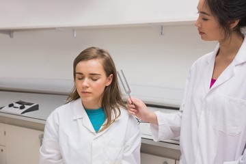 Wall Mural - student doing a hearing test
