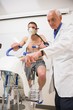 © WavebreakMediaMicro - Doctor with man doing fitness test