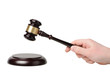 Hand with gavel on a white background