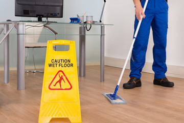 Wall Mural - Wet Floor Sign In Office