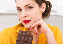 Beautiful Woman With Chocolate Bar