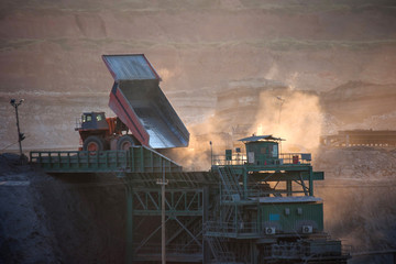 coal-preparation plant. Big mining truck at work site coal trans