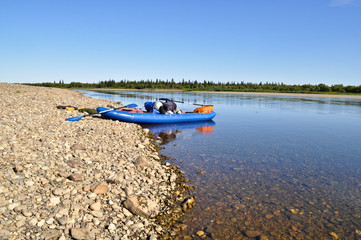 Broad river and the boat.