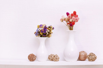 Sticker - Composition of dried flowers on white wall background