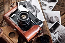 Old Rangefinder Camera And Black-and-white Photos.