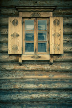 Windows With Shutters, Patterned On The Wall Of The Old Wooden H