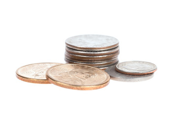 Pile of US coins isolated on white background