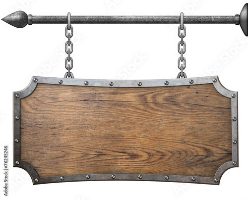 wood sign hanging on metal ...