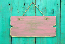 Blank Pink Wood Sign On Antique Green Painted Background