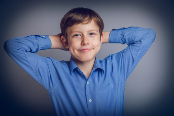 Wall Mural - teenager boy of 10 years European appearance feels joy