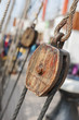 Wooden pulley with ropes on deck