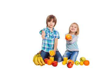 Boy and girl near fruit