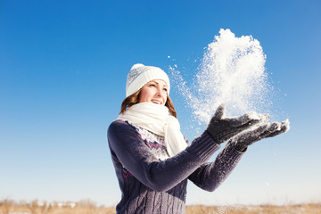 Wall Mural - Portrait of happy young woman have fun at beautiful sunny winter