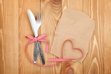 Leinwandbilder - Blank paper for recipe or note and silverware