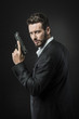 © stokkete - Cool undercover agent with gun