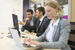 © ldprod - Group of business people in a modern office, working on computer