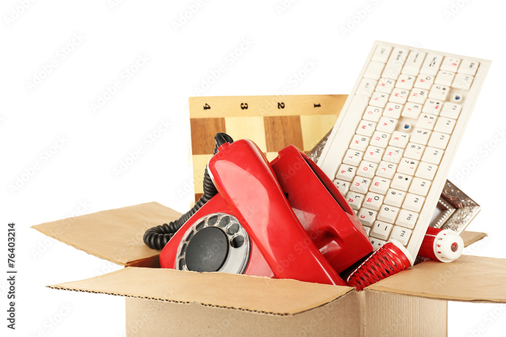 Box of unwanted stuff isolated on white
