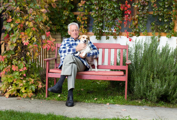 Wall Mural - Senior man with dog