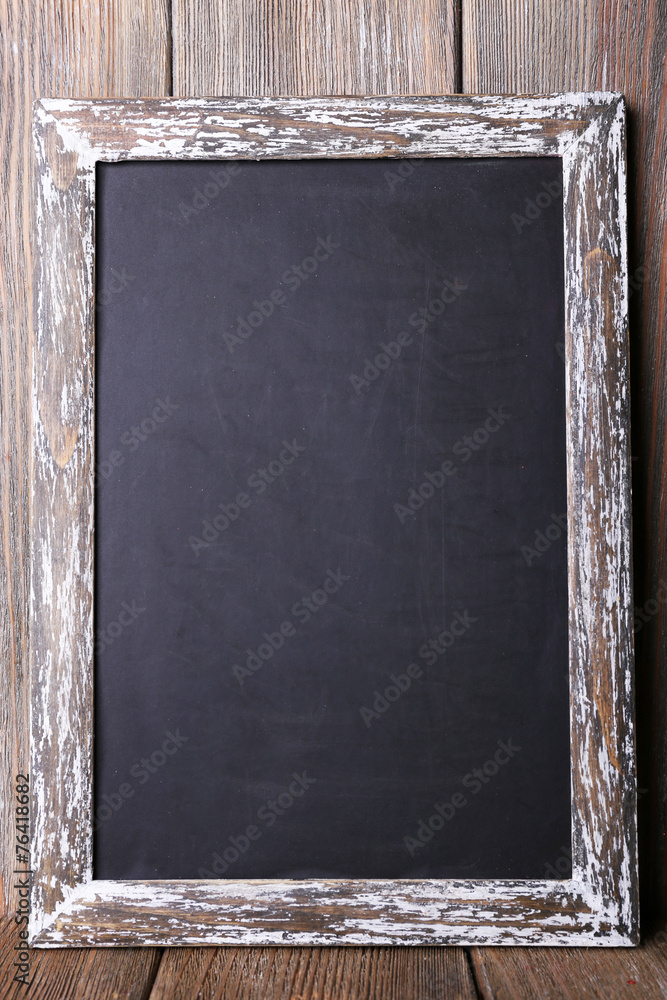 Menu board on rustic wooden planks background
