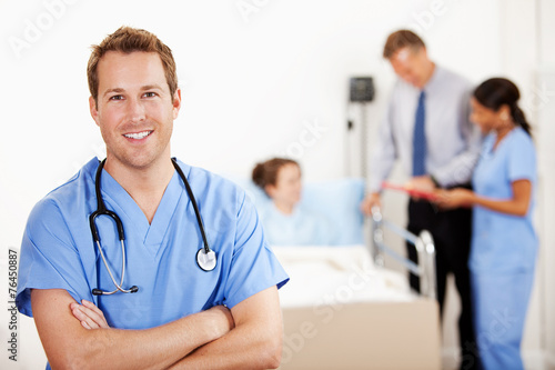 Fotografie, Obraz Hospital: Cheerful Male Nurse in Hospital Room