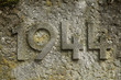 Year 1944 carved in the stone. The years of World War II.