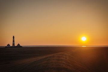 Sunset on dike of Westerhever