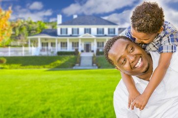 Wall Mural - Mixed Race Father and Son In Front of House